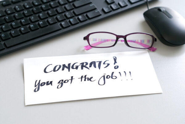 Congrats you got the job written on a white envelope